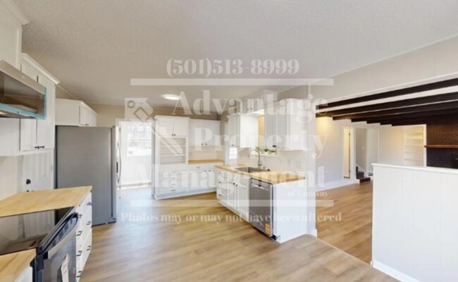 Building Photo - Showings Available!
