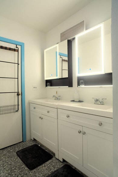 downstairs rooms share a bathroom with individual vanities - 1114 Pawnee Ln