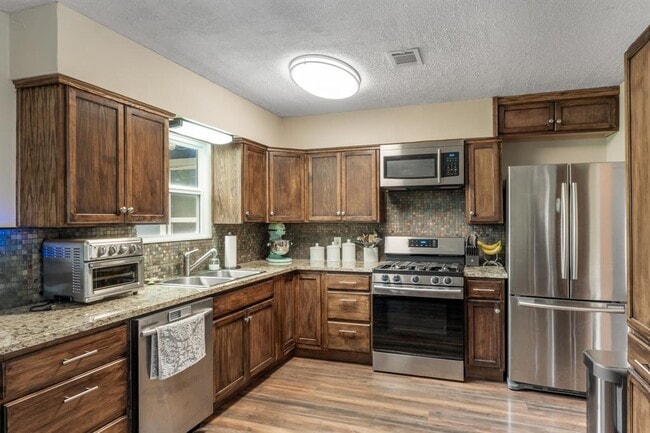 Building Photo - 4705 Menchaca Rd