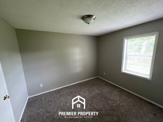Building Photo - HALF OFF FIRST MONTHS RENT! Charming 3BR/1.5BA in 38118 | Hardwood Floors & Spacious Fenced Backyard