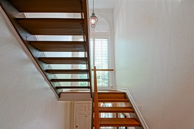 Building Photo - BRIGHT & AIRY, REAR-UNIT TOWNHOUSE W/ SPACIOUS PATIO, BALCONY & HUGE 2-CAR GARAGE IN GATED COMMUN...