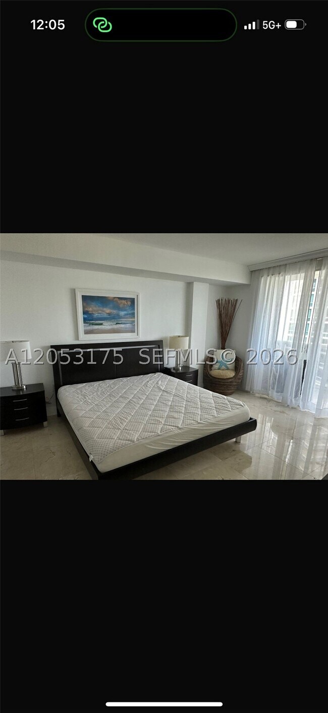 Building Photo - 10275 Collins Ave
