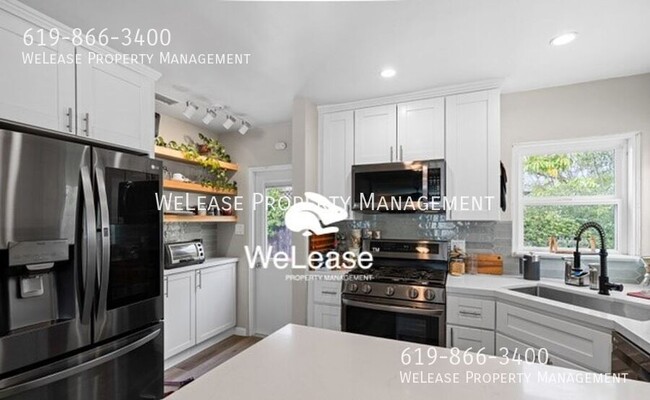 Primary Photo - Charming 2-Bedroom Home with Garage & Mode...