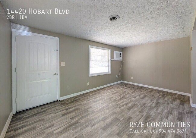 Building Photo - 14420 Hobart Blvd