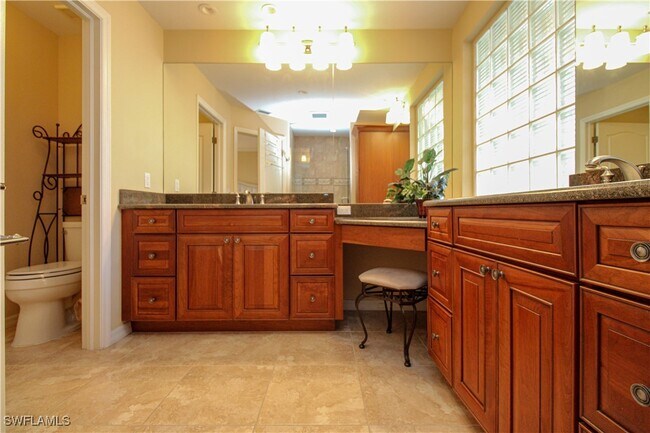 Building Photo - 7024 Pelican Bay Blvd