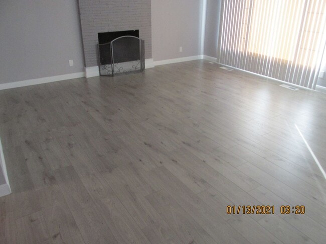 Building Photo - Remodeled !  Hardwood Flooring Throughout & New Carpet in Bedrooms, Tile, Granite, Large Living r...