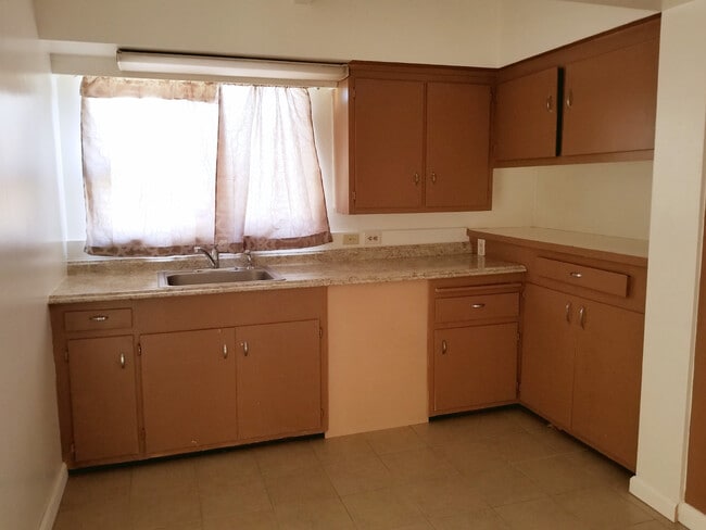 Building Photo - Triplex Unit Coming Soon
