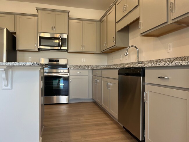 Building Photo - Beautiful Newly Constructed 3/.25 Townhome!