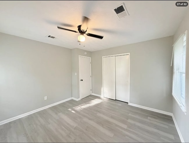 Building Photo - AVAILABLE NOW – FAIRBURN, GA 4 Bedrooms + Flexible Main-Level Living Space | Full Bathroom on Mai...
