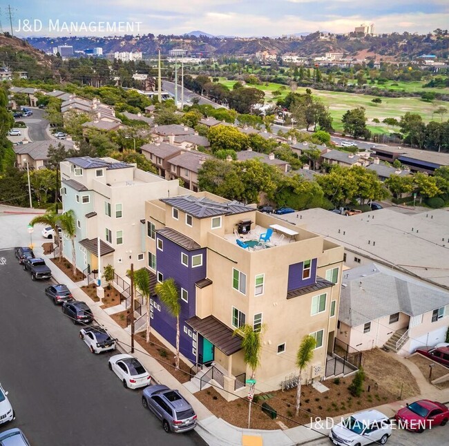 Building Photo - Gorgeous Townhome w/ Rooftop Decks and Oce...