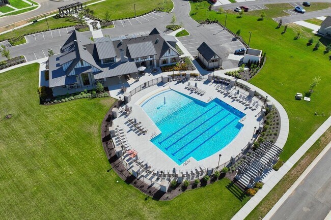 Building Photo - **BE THE LUCKY ONE TO LIVE IN THIS 2024-BUILT END-UNIT TOWNHOME IN A RESORT-STYLE COMMUNITY**