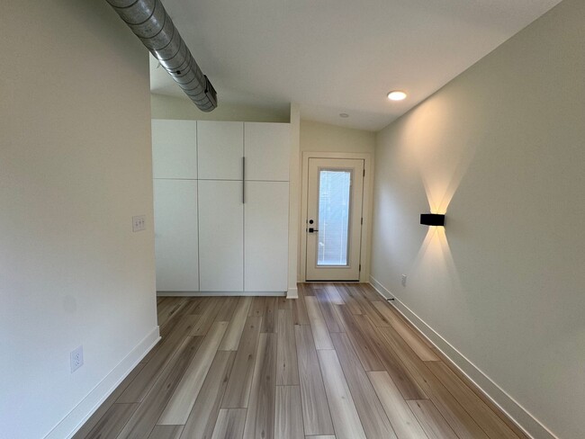 Building Photo - Vaulted Ceilings & Hardwood Floors in This Charming Indianapolis L