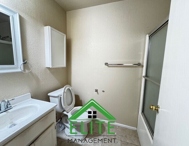 Building Photo - **Spacious 3-Bedroom Condo with 2-Car Gara...