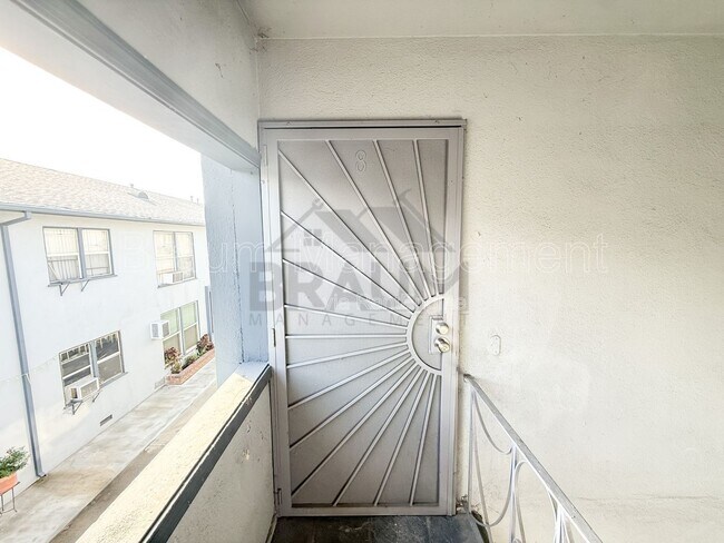 Building Photo - 7339 Woodman Ave