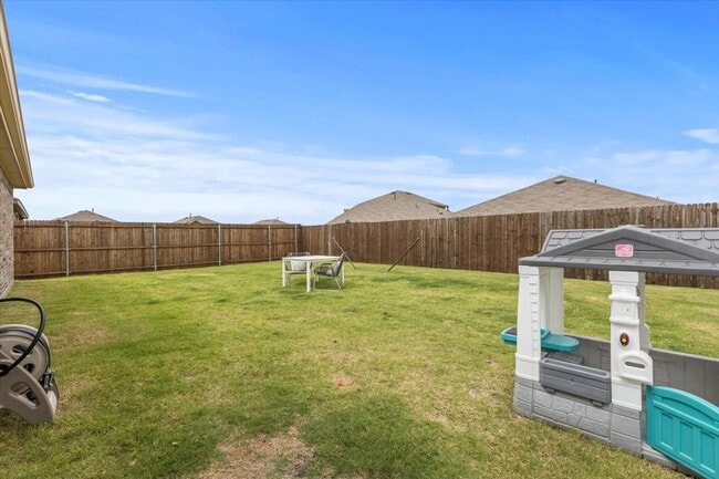 Building Photo - Modern single-story home with 4 bedrooms, 2 bathrooms, open-concept living, stylish kitchen, two-...