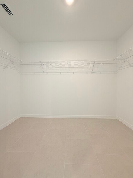 Primary walk-in closet - 12216 Sydney Ct