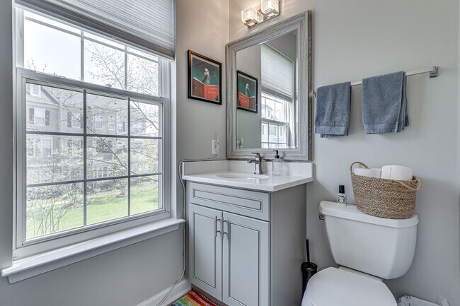 Building Photo - Belmont Bay Beauty! Three level two car ga...