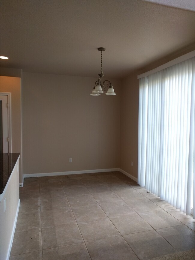 Building Photo - Gated Community Stunner ready to be called...