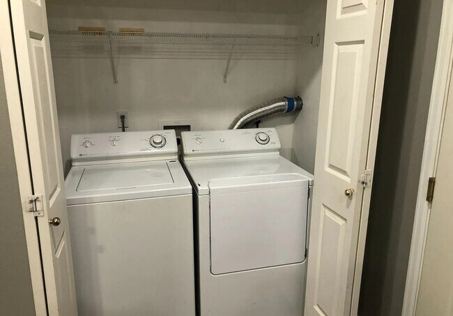 Building Photo - Updated 2 Bed, 2 Bath Main Floor Condo with Garage