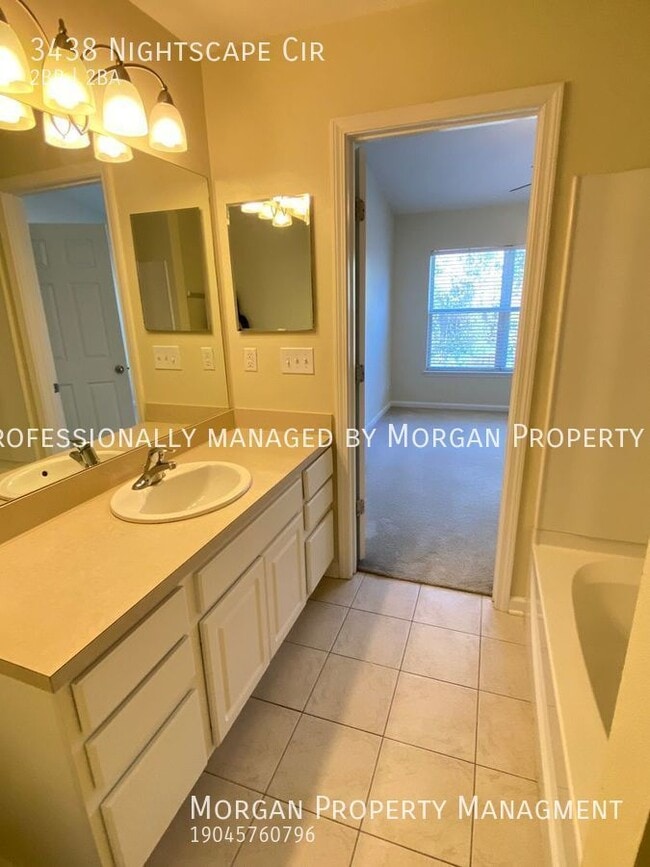 Building Photo - GATED COMMUNITY OF WOLF  CREEK 2BR/2.5BA  ...