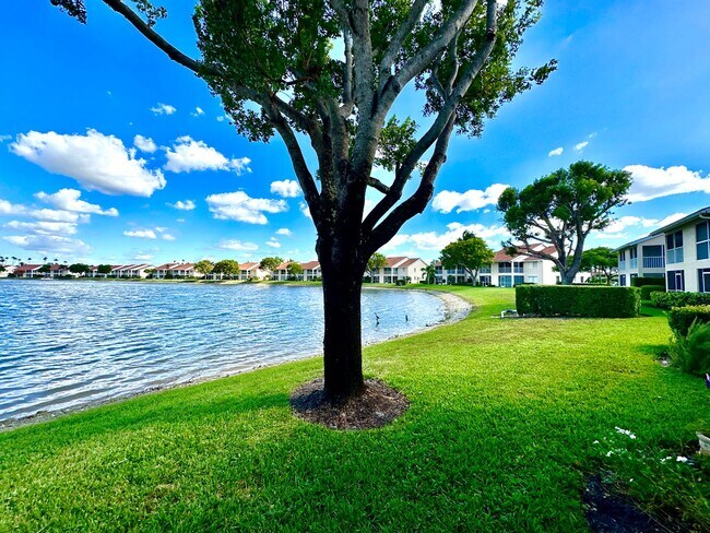 Building Photo - ** EMERALD LAKES ** 2 BED / 2 BATH CONDO - LAKE VIEW - CENTRAL NAPLES - ANNUAL RENTAL
