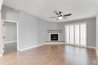 Building Photo - Remodeled 3-Bedroom Condo with Fireplace 8...
