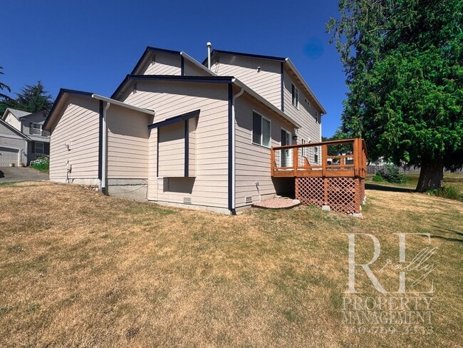 Building Photo - Immaculate Bremerton Home with Expansive Yard, Multiple Living Areas & Designer Kitchen