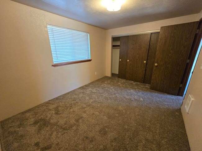 Building Photo - READY NOW. Huge backyard, lovely two bedro...