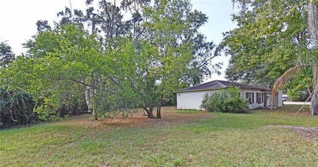 Building Photo - 12422 N Howard Ave