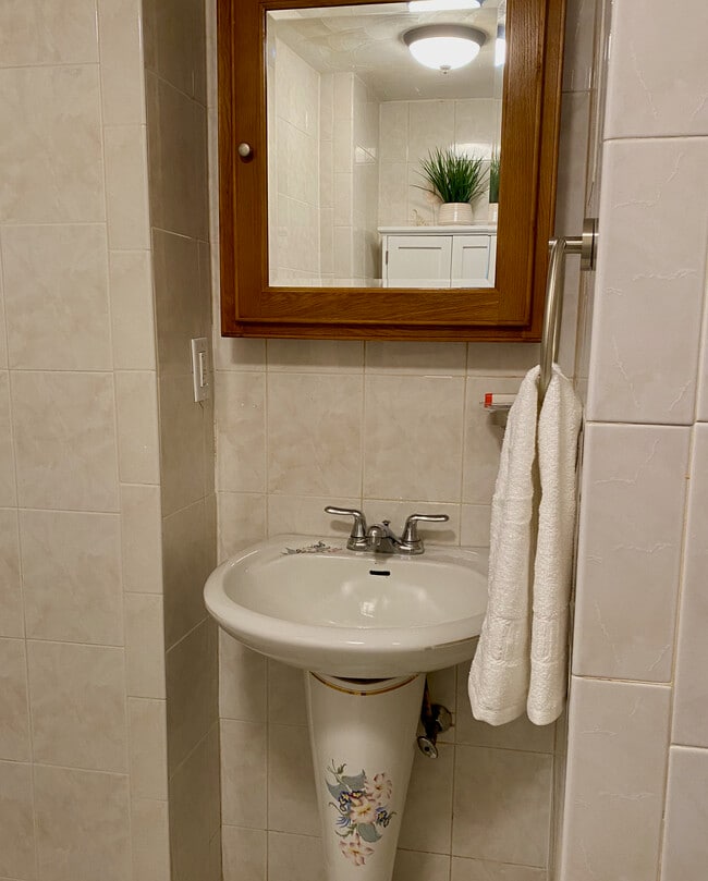 Bathroom sink area - 7 Alpine Ct