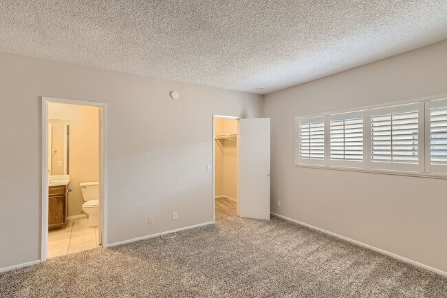 Building Photo - Freshly Updated 2-Bedroom Condo with Attached Garage in Gated Winnetka Community