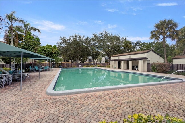 Building Photo - 3167 Cocoplum Cir