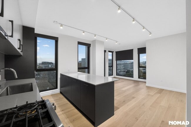 Building Photo - Act Fast: Luxury SoMa Corner Unit w/ EV Parking & Views