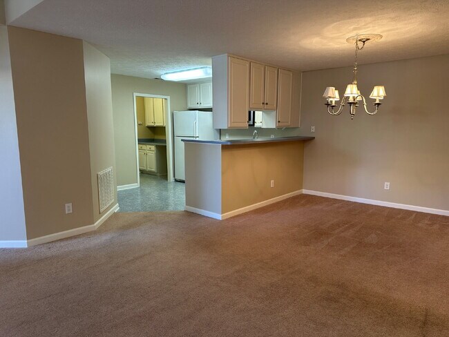 Building Photo - Well-Maintained Condo with 2 Bonus Rooms & Attached 2-Car Garage