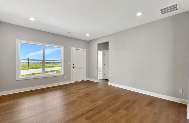 Building Photo - Modern 3-Bed Ranch in Maize – Zero-Entry L...