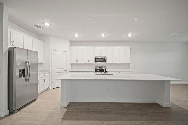 Building Photo - NEW CONSTRUCTION 3beds+Den 3 baths located...