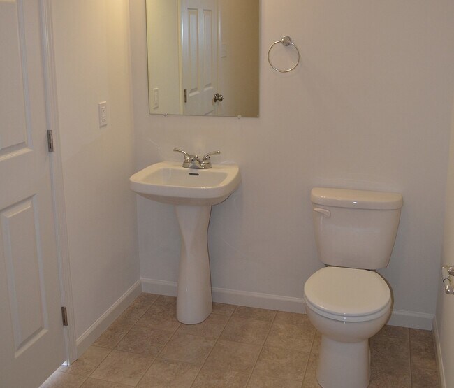 Building Photo - Fantastic Townhome - Pet Friendly (1 pet) with garage and NO MOWING!