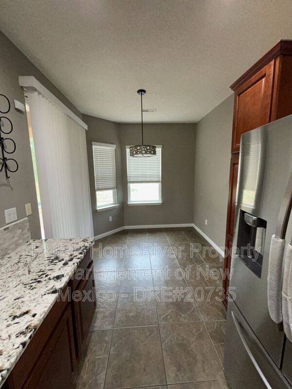 Building Photo - 10115 Avenida Vista Cerros NW