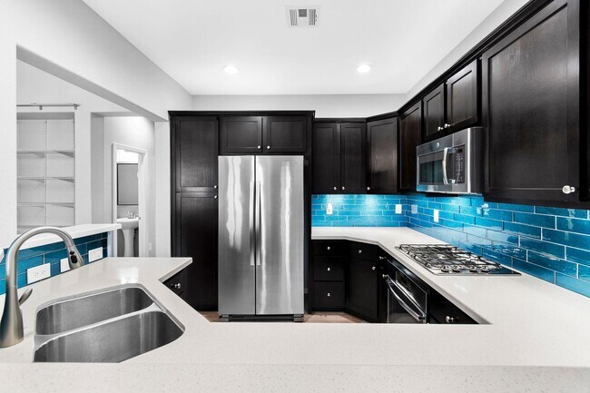 Building Photo - Live Where the Action Is: Modern Townhome Steps from Downtown Summerlin! available 4/1