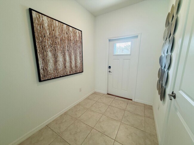 Building Photo - Townhouse in Land O' Lakes - The Townes at Lake Thomas