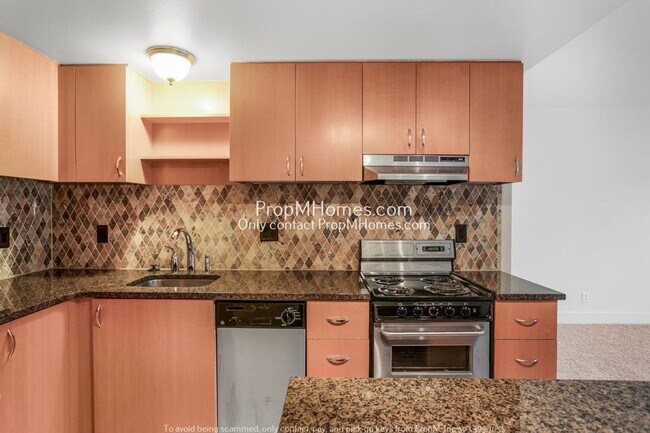 Building Photo - Lakefront Living – One-Bedroom Condo + Lak...