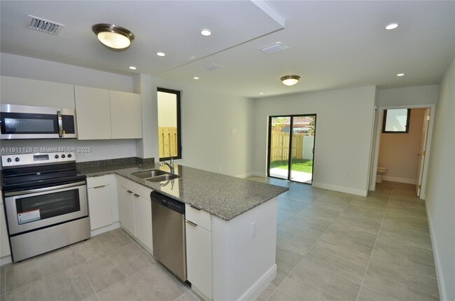 Building Photo - 4374 E 10th Ave