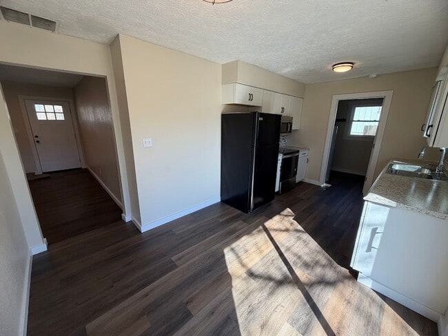 Building Photo - 3 Bedroom Home with Fenced Backyard & Storage Shed