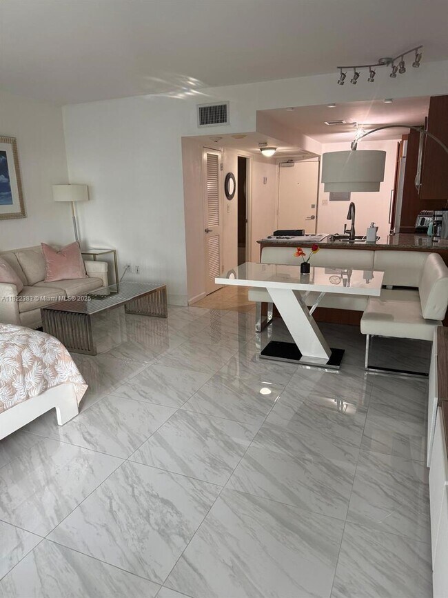 Building Photo - 10275 Collins Ave