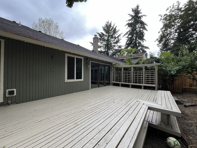 Building Photo - Spacious 3-Bedroom Home with Custom Stone Fireplace, Attached 2-Car Garage & Expansive Backyard i...