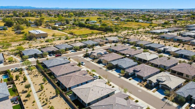 Building Photo - Solar-Powered Savings in Ovation at Meridian – 55+ Gated Living in Queen Creek