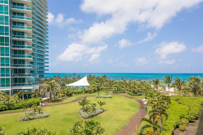 Building Photo - 10275 Collins Ave