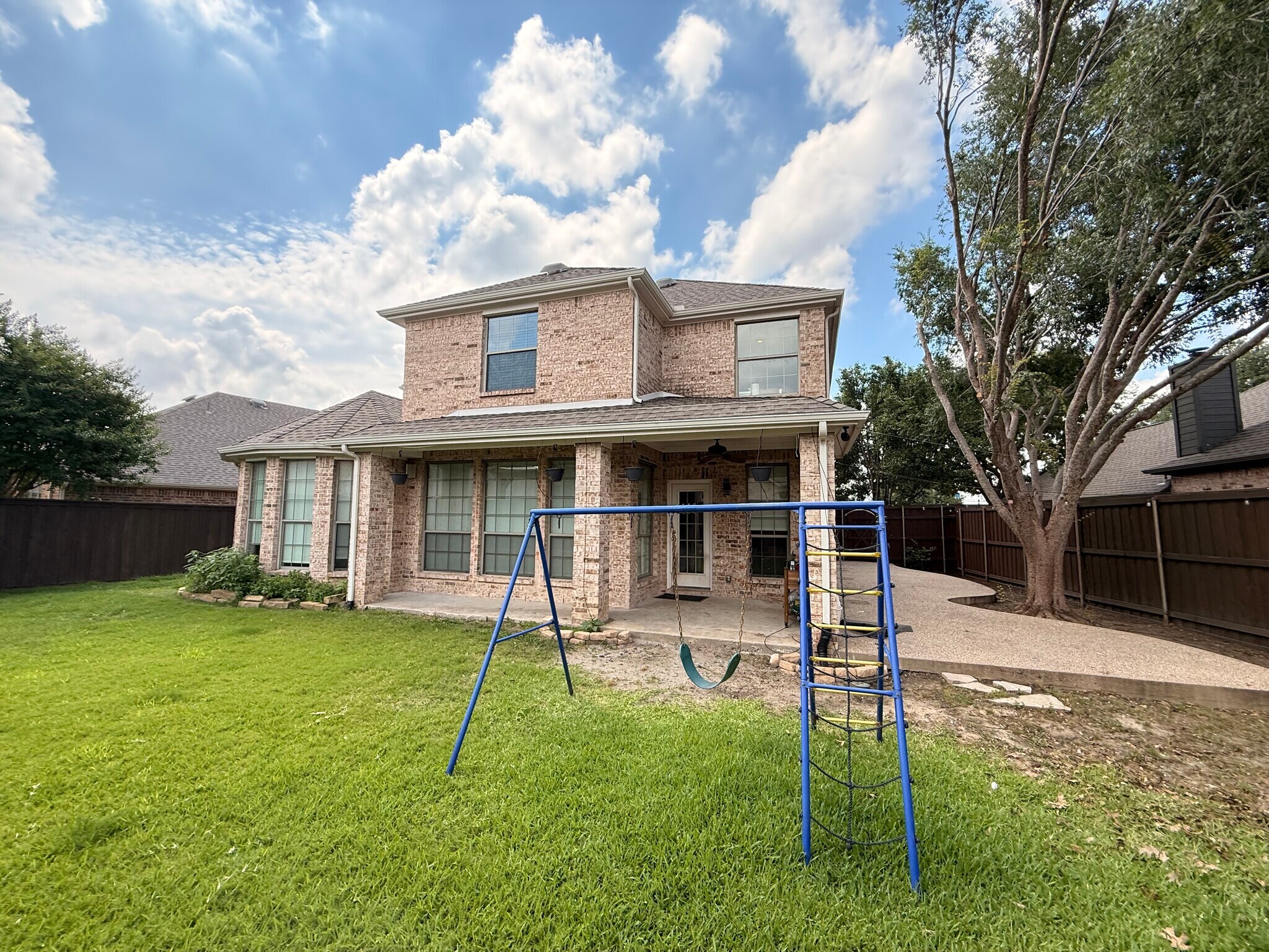 Yard, swing and patio - 2489 Yuma Dr