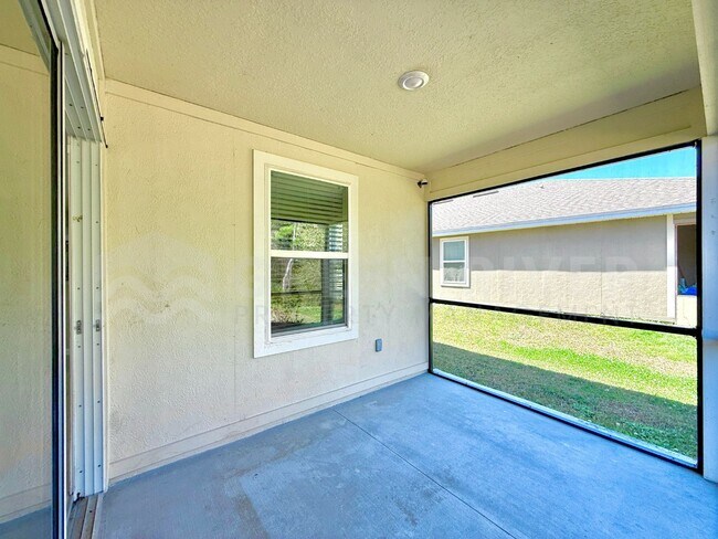 Building Photo - Room to Live, Space to Thrive! Stunning 6BR Home with Solar, Upgrades & Screened Lanai in Macclen...