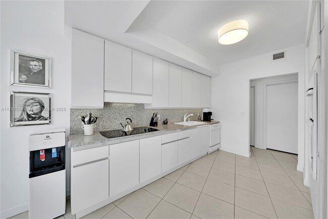 Building Photo - 9601 Collins Ave